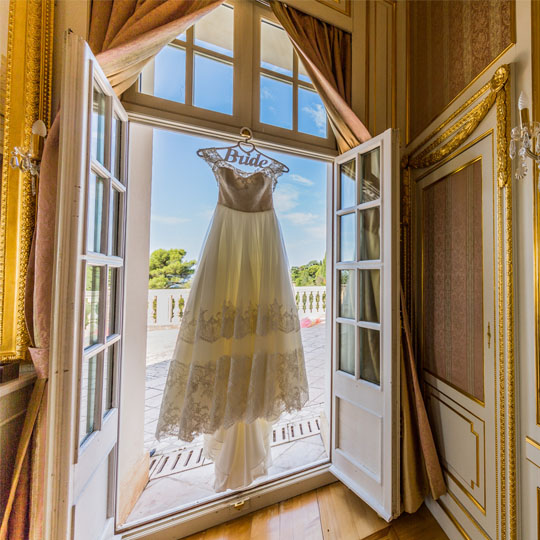 Wedding dress hanging over the bay of Monaco
